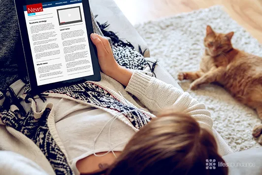 reading news on tablet